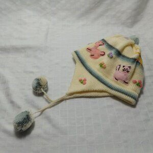 Pretty warm hat with colorful embroidery and pom-poms, 2005